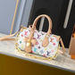 LV X TAKASHI MURAKAMI ONTHEGO EAST WEST CHAIN 25CM