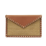 VO GARAVANI ROCKSTUD RAFFIA CLUTCH BAG IN BROWN 28CM