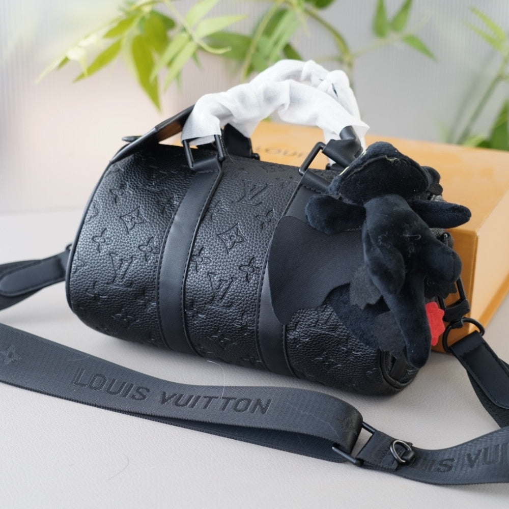 LV KEEPALL BANDOULIÈRE 25 MONOGRAM TAURILLON BLACK 24CM M20900