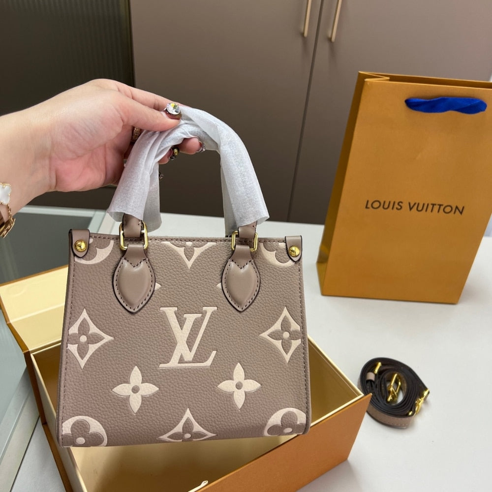 LV ONTHEGO BB BICOLOR MONOGRAM EMPREINTE DOVE GRAY AND CREAM 18CM M47054