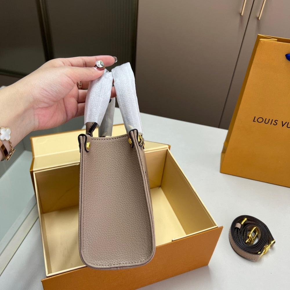 LV ONTHEGO BB BICOLOR MONOGRAM EMPREINTE DOVE GRAY AND CREAM 18CM M47054