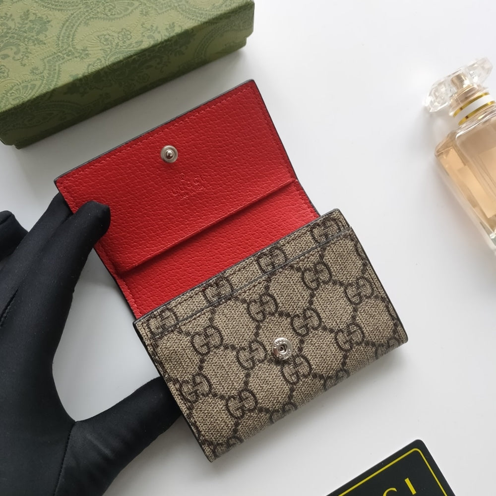 GG IVORY INTERIOR GG TRI FOLD WALLET BEIGE AND EBONY 10CM