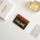 CELINE CARD HOLDER IN TRIOMPHE CANVAS WITH CELINE PRINT TAN 10CM 10B702CLY 04LU