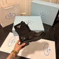 PD BRUSHED-LEATHER AND RE-NYLON BOOTS SHINY BLACK