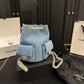 CC 25C GOLD TONE METAL DENIM BACKPACK BLUE 24CM