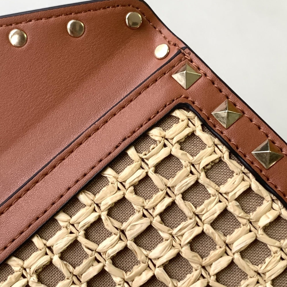 VO GARAVANI ROCKSTUD RAFFIA CLUTCH BAG IN BROWN 28CM