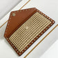 VO GARAVANI ROCKSTUD RAFFIA CLUTCH BAG IN BROWN 28CM