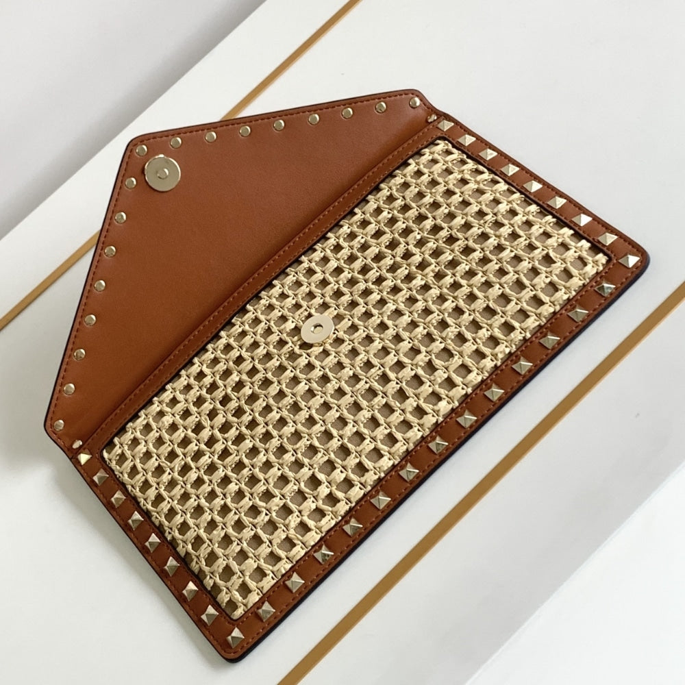 VO GARAVANI ROCKSTUD RAFFIA CLUTCH BAG IN BROWN 28CM