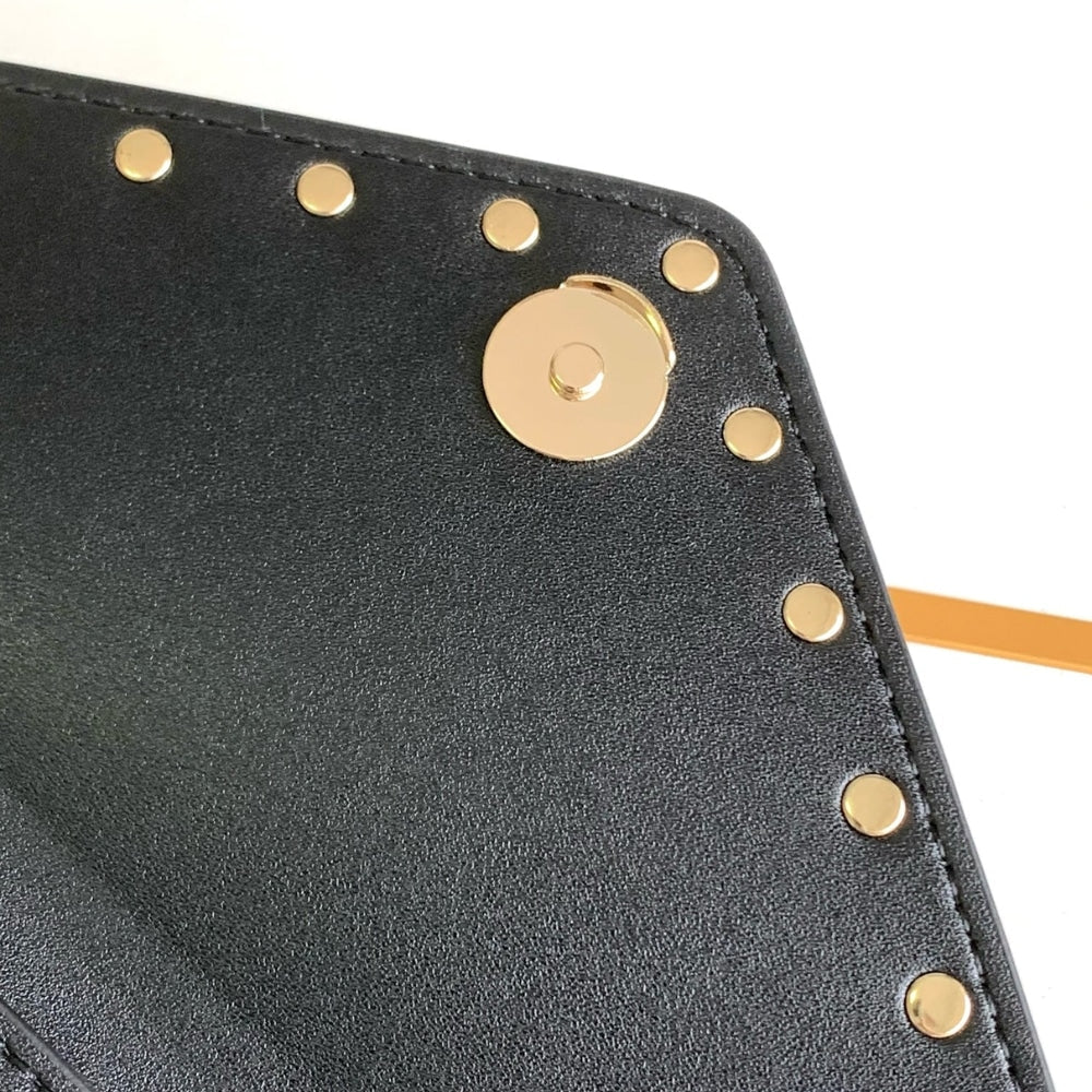 VO GARAVANI ROCKSTUD RAFFIA CLUTCH BAG IN BLACK 28CM