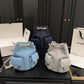 CC 25C GOLD TONE METAL DENIM BACKPACK BLUE 24CM