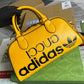 GG 702397 shoulder bag Handbag yellow adidas x