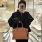 M22914 Lock It MM Brown Handbag