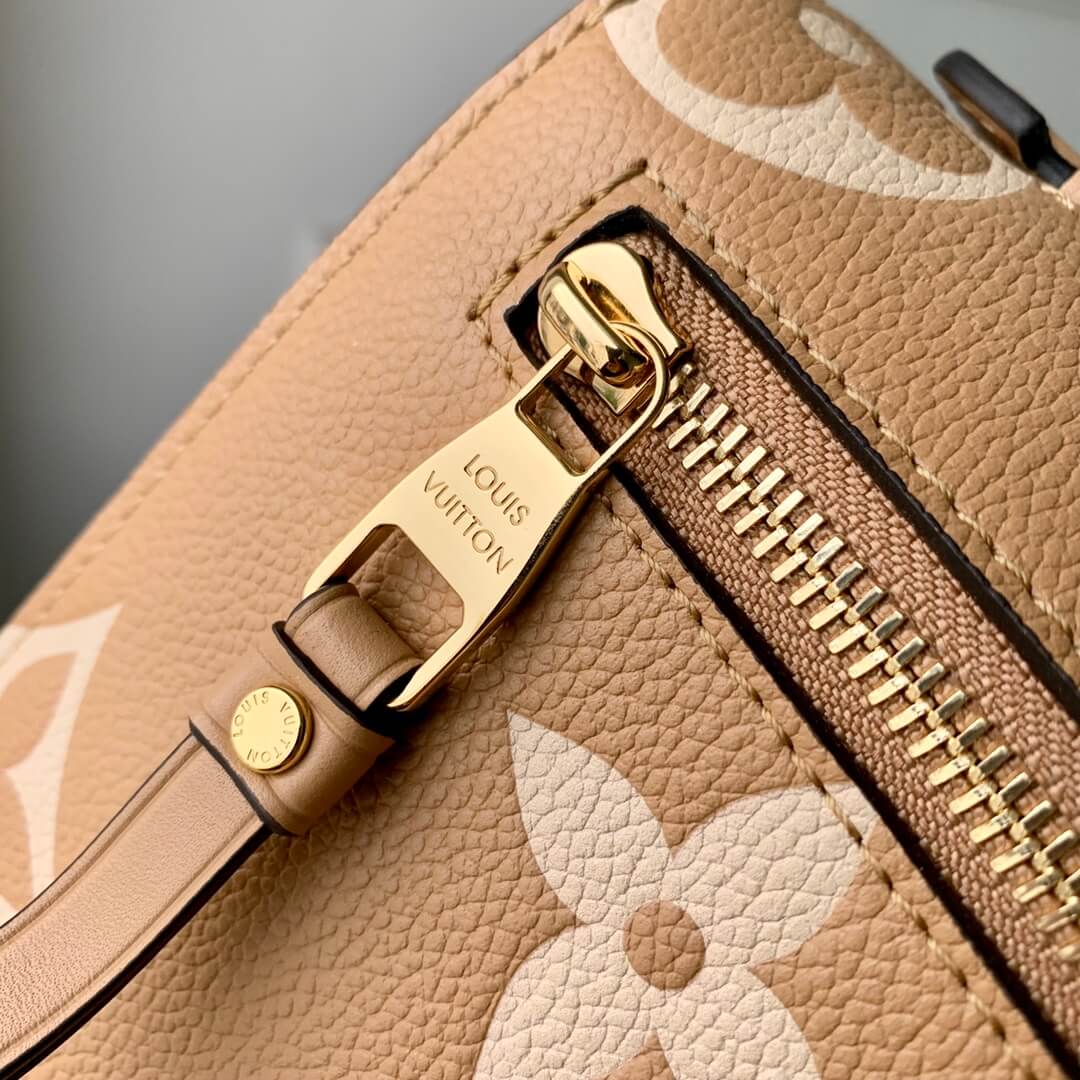 M45773 Pochette Metis Monogram Empreinte shoulder cross body bag brown