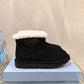 PD SHEARLING BOOTIES BLACK WITH RUBBER TRIANGLE LOGO