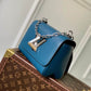 M21033 TWIST PM Monogram 19cm Toledo Blue