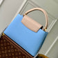 M21689 Capucines MM Handbag 31cm blue Silk texture cowhide