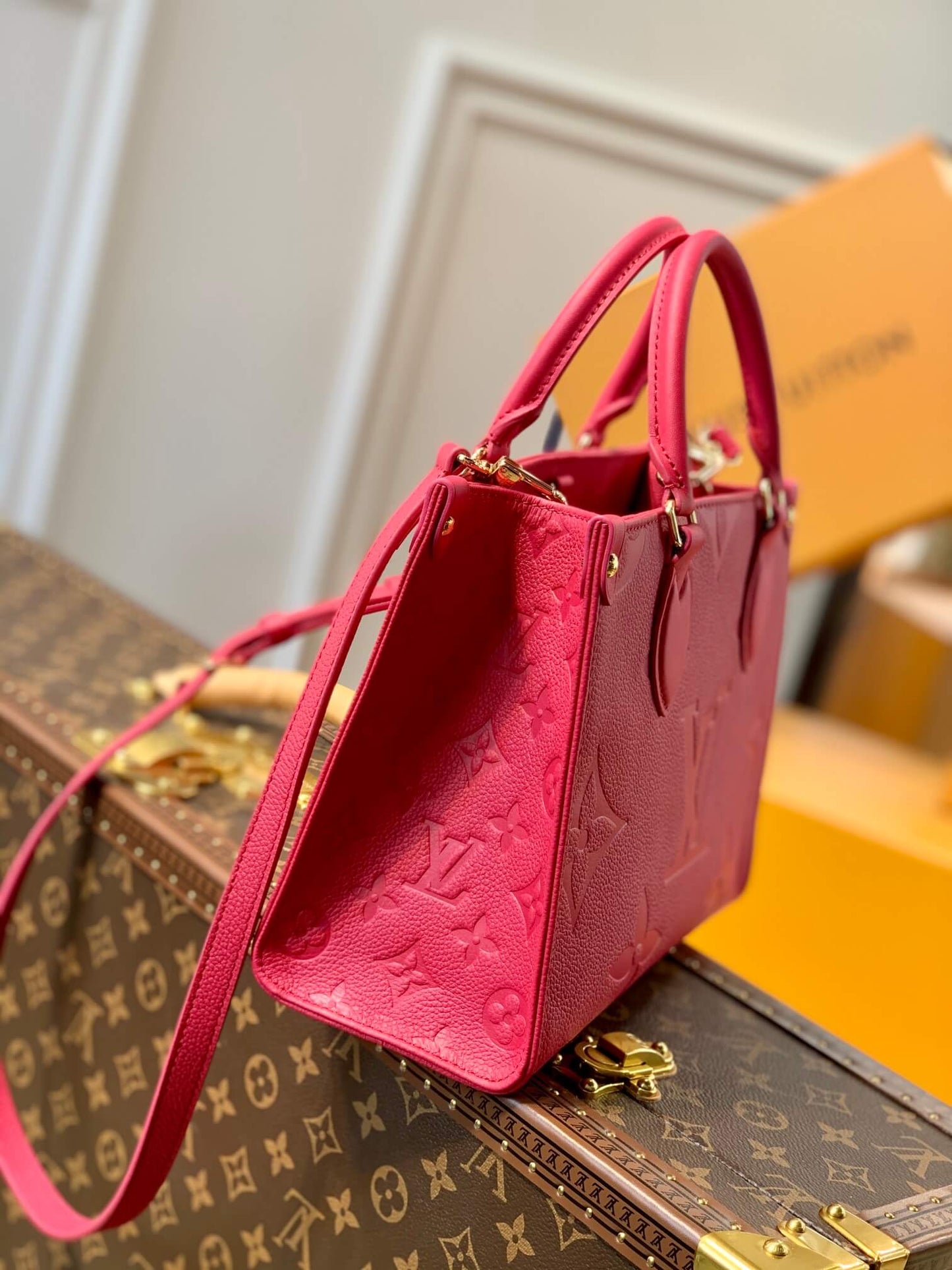 M45660 ONTHEGO PM tote bag Oversized monogrm empreinte leather Rose Red